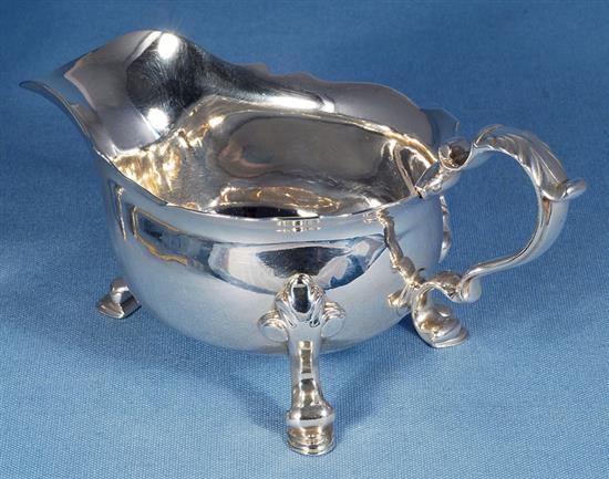 A pair of George II silver sauce boats, attributed to Joseph Sanders, length 195mm, weight 24.4 oz/760grms.